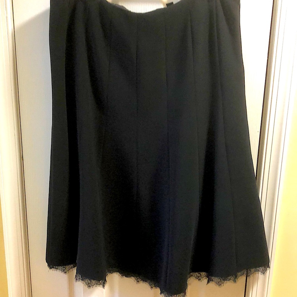 Flared black skirt with lace bottom.  Mid calf length.  Excellent condition.
